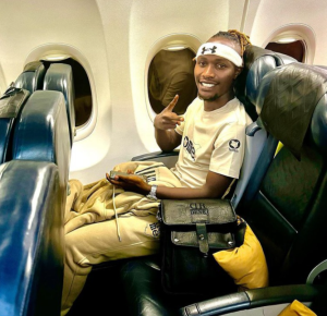 An Image of Moya David on a plane